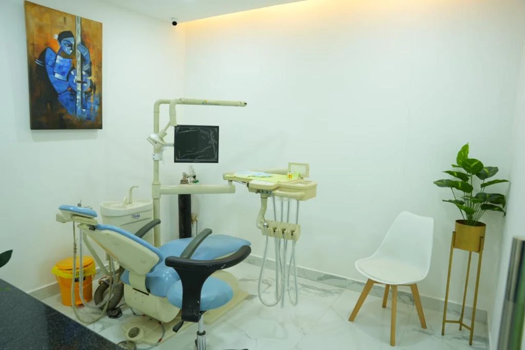Dental treatment room with chair and monitor