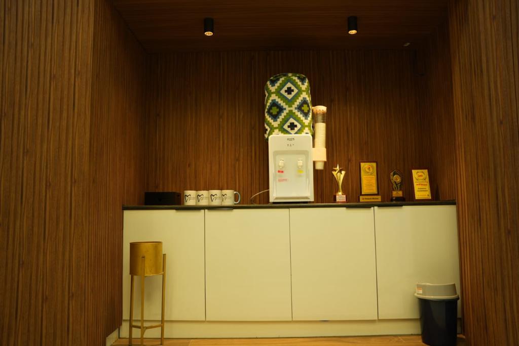 Awards and recognition displayed at Mohan's Dental & Maxillofacial Center